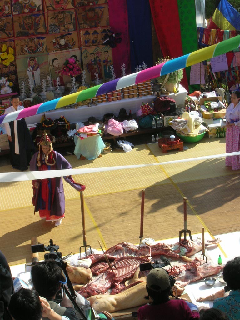 A mudang performing gut.